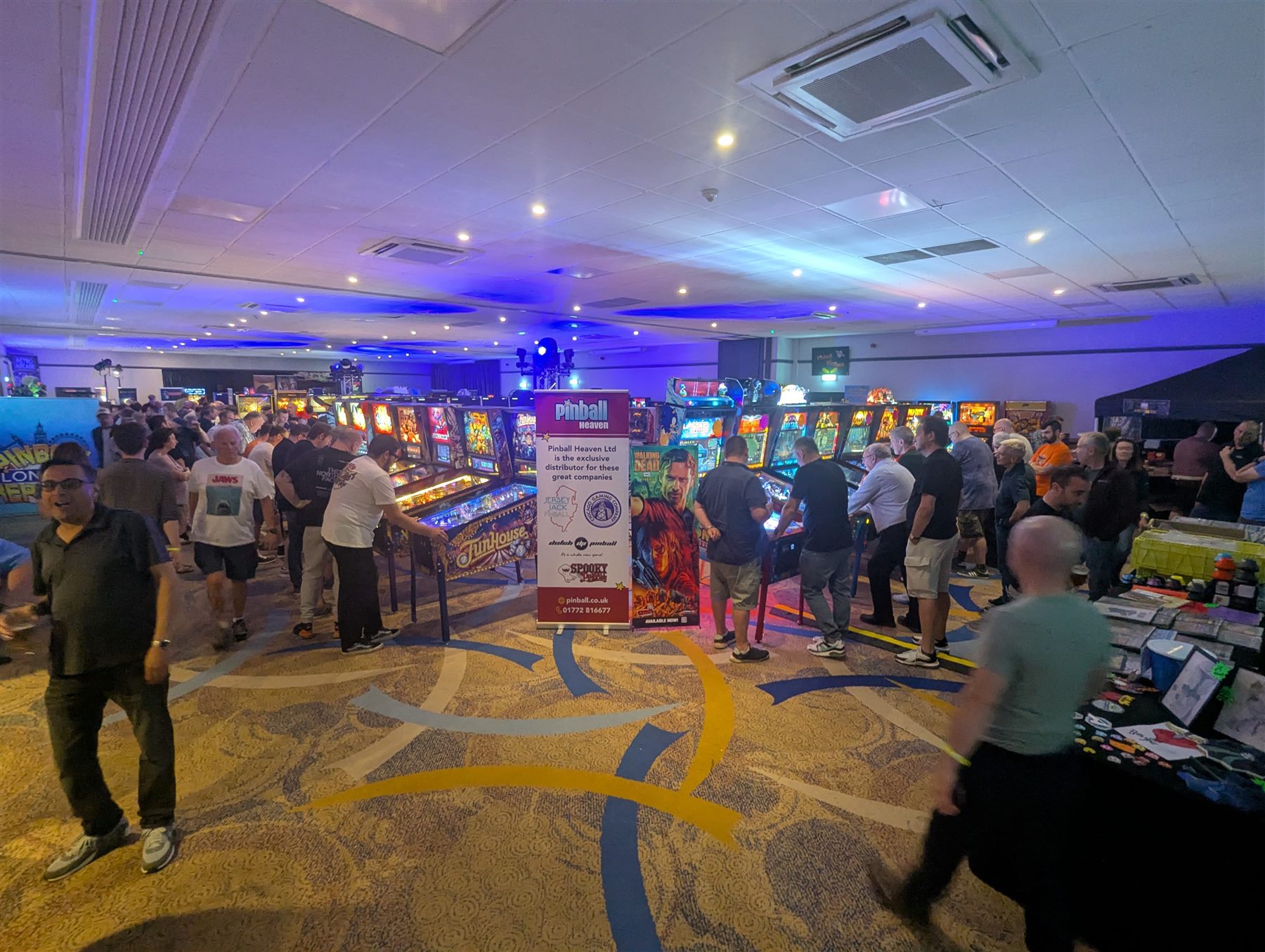 The packed UK Pinfest main hall filled with pinball machines and players