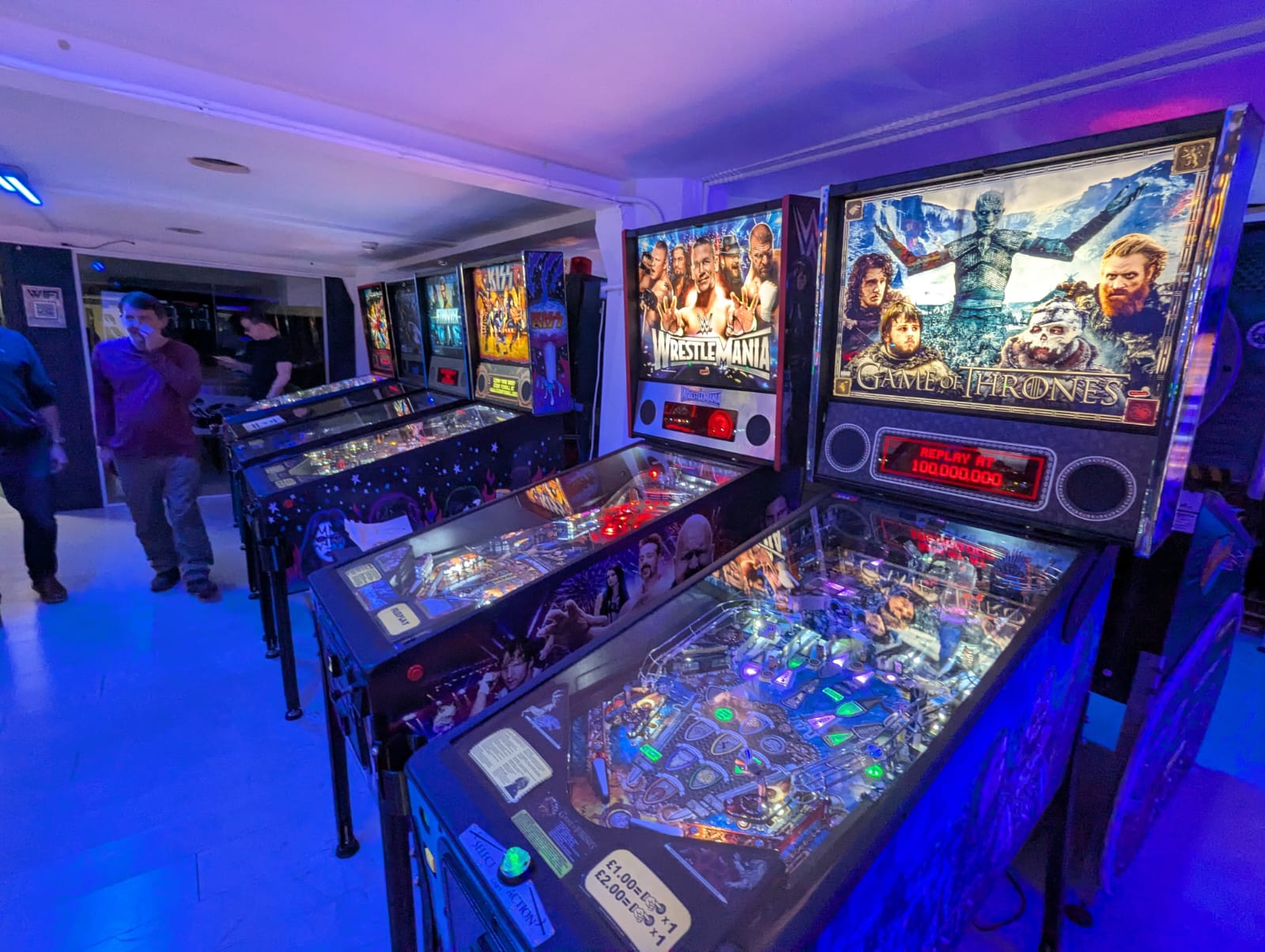 Visitors enjoying the pinball collection at The Pinball Factory Birmingham